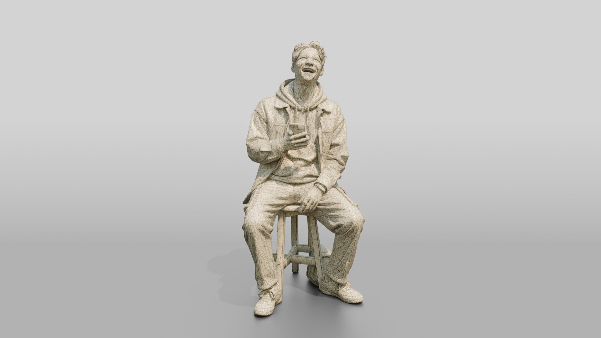 Asian Man Laughing at Phone