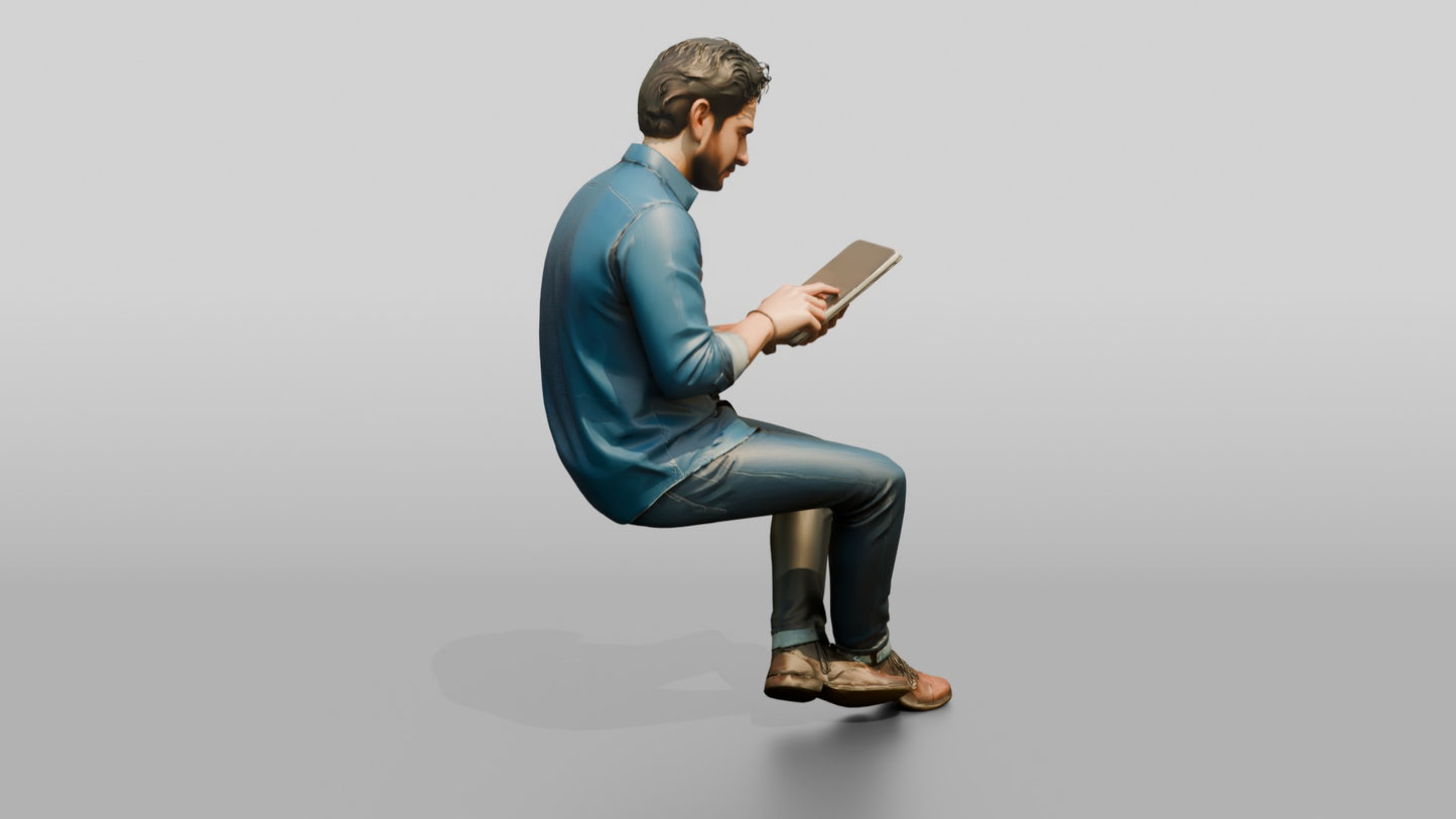 Man Using a Tablet on a Stool