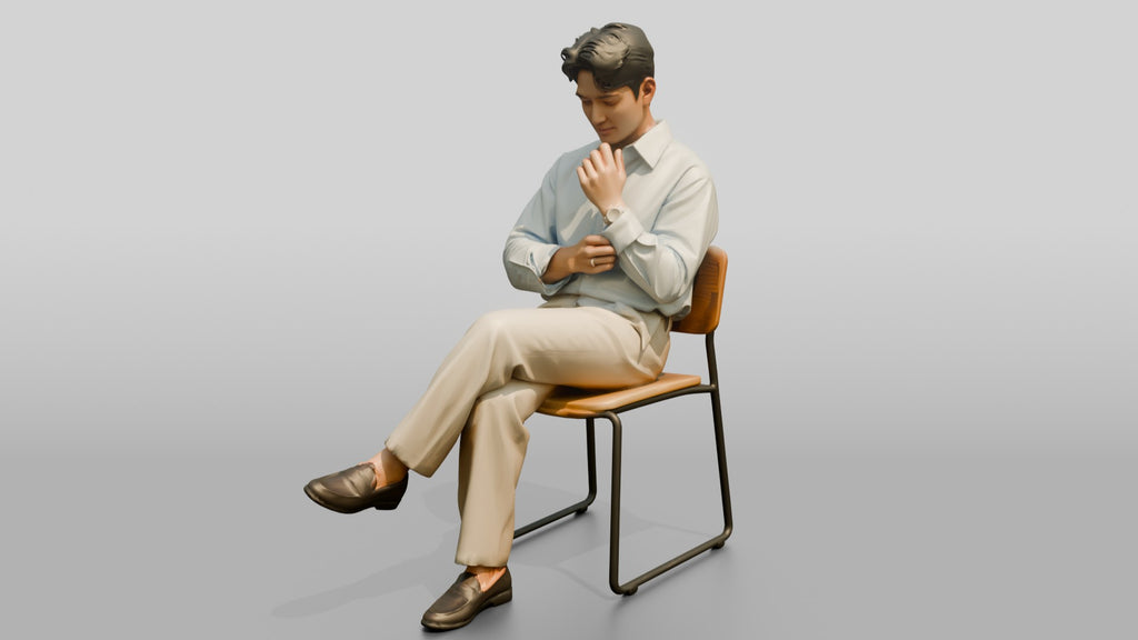 Businessman Sitting in Light Blue Shirt
