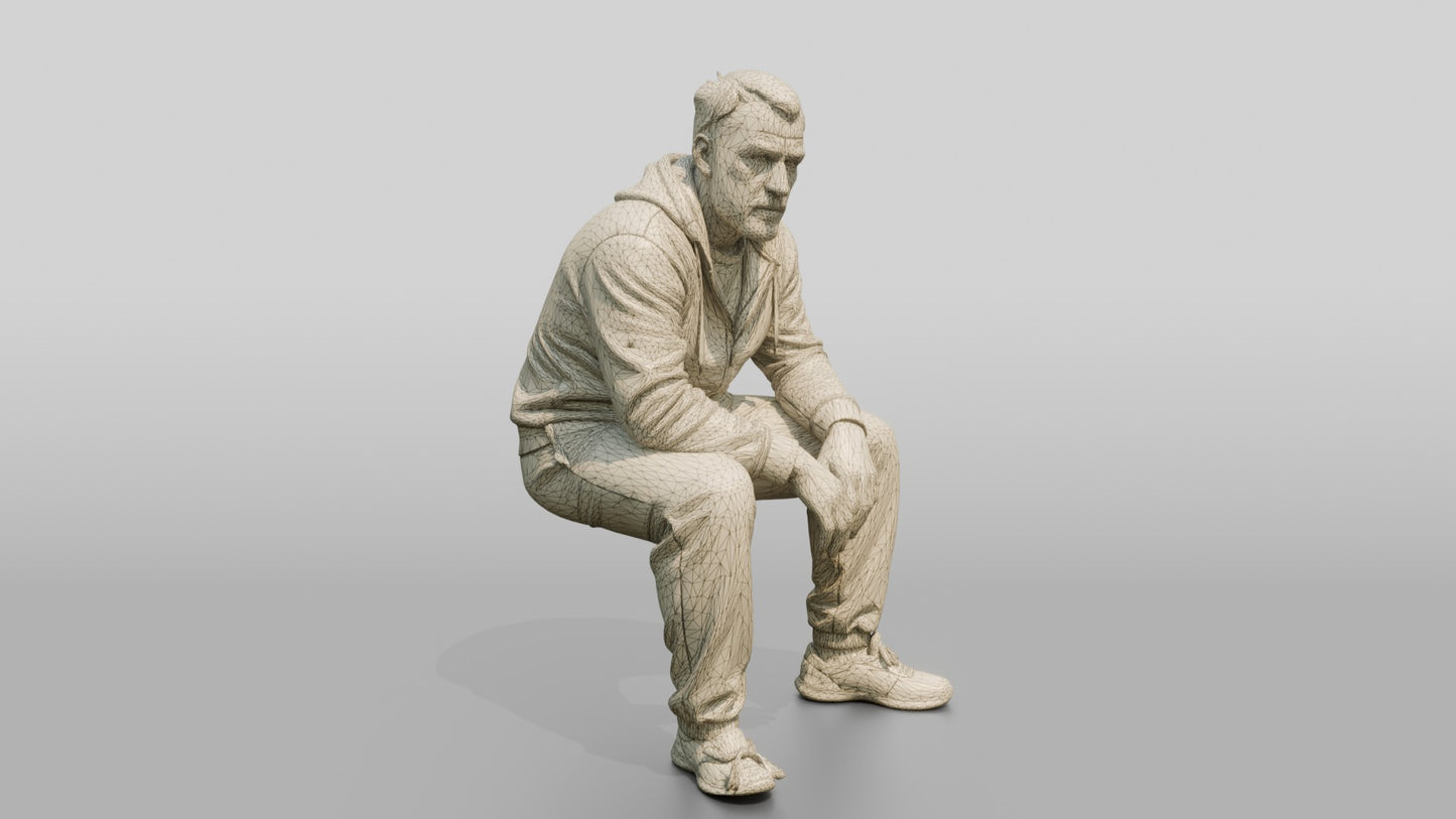 White Male Prisoner in a Grey Zip-up Hoodie and Dark Sweatpants