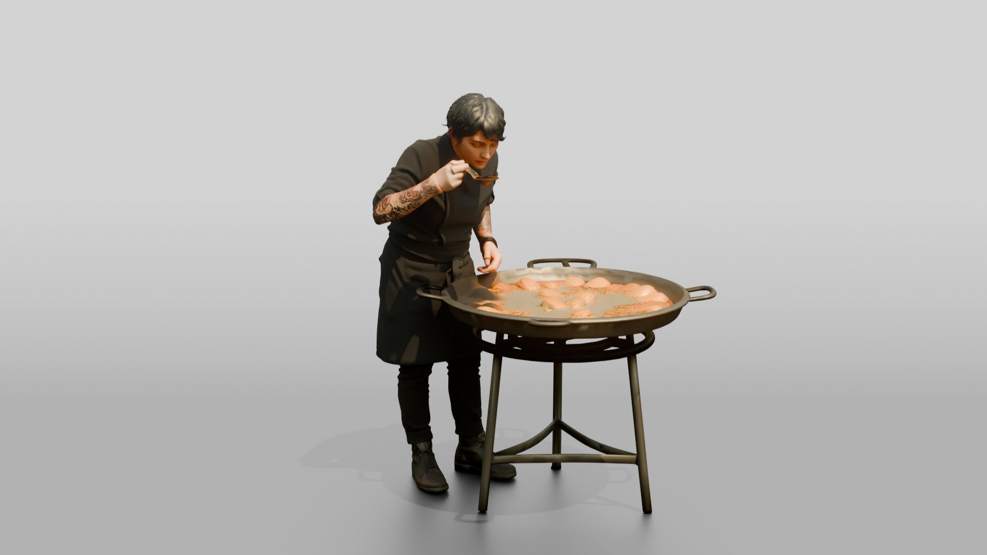 Chef Checking a Paella Pan