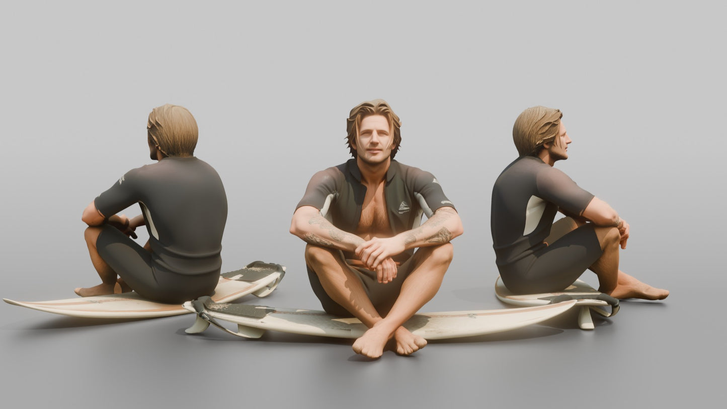 Surfer Sitting on His Surfboard