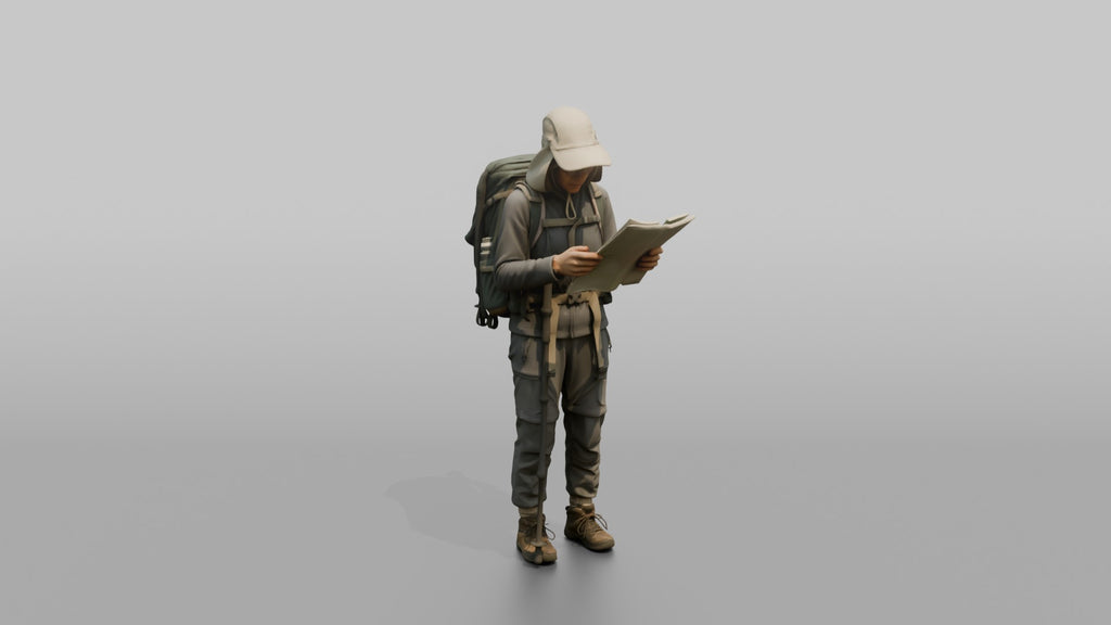 Trekker Inspecting a Trail Map