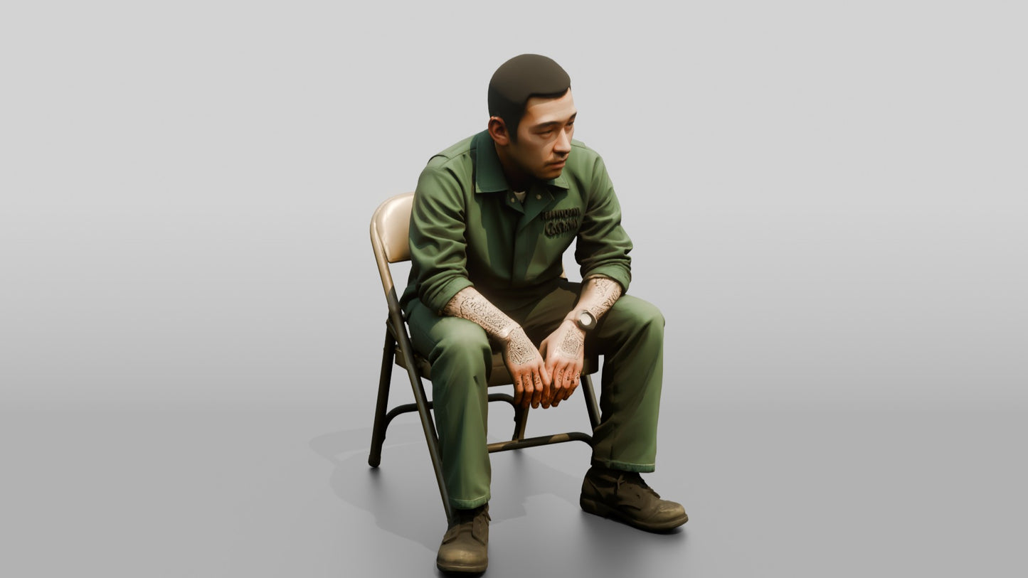 East Asian Male Prisoner in a Green Uniform