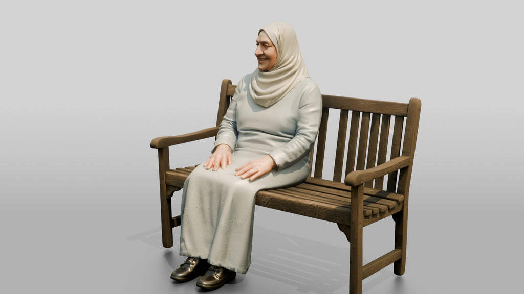 Elderly Iraqi Woman in Hijab Smiling on a Bench