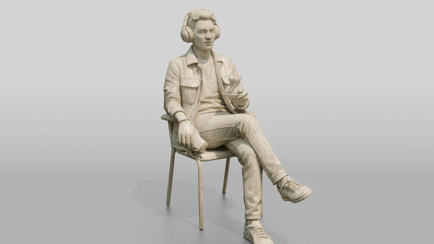Man Listening to Music with Tea