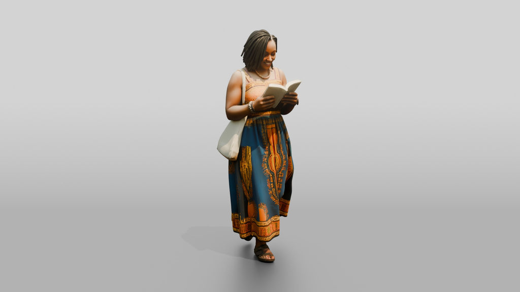 African Woman Reading a Book in a Printed Maxi Dress