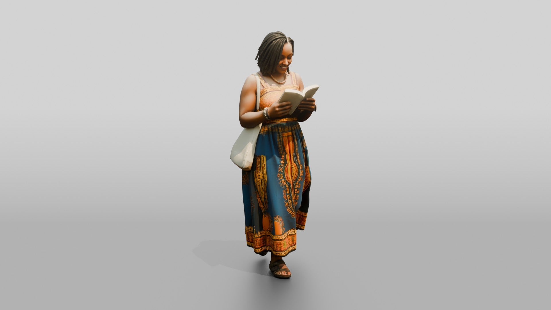 African Woman Reading a Book in a Printed Maxi Dress