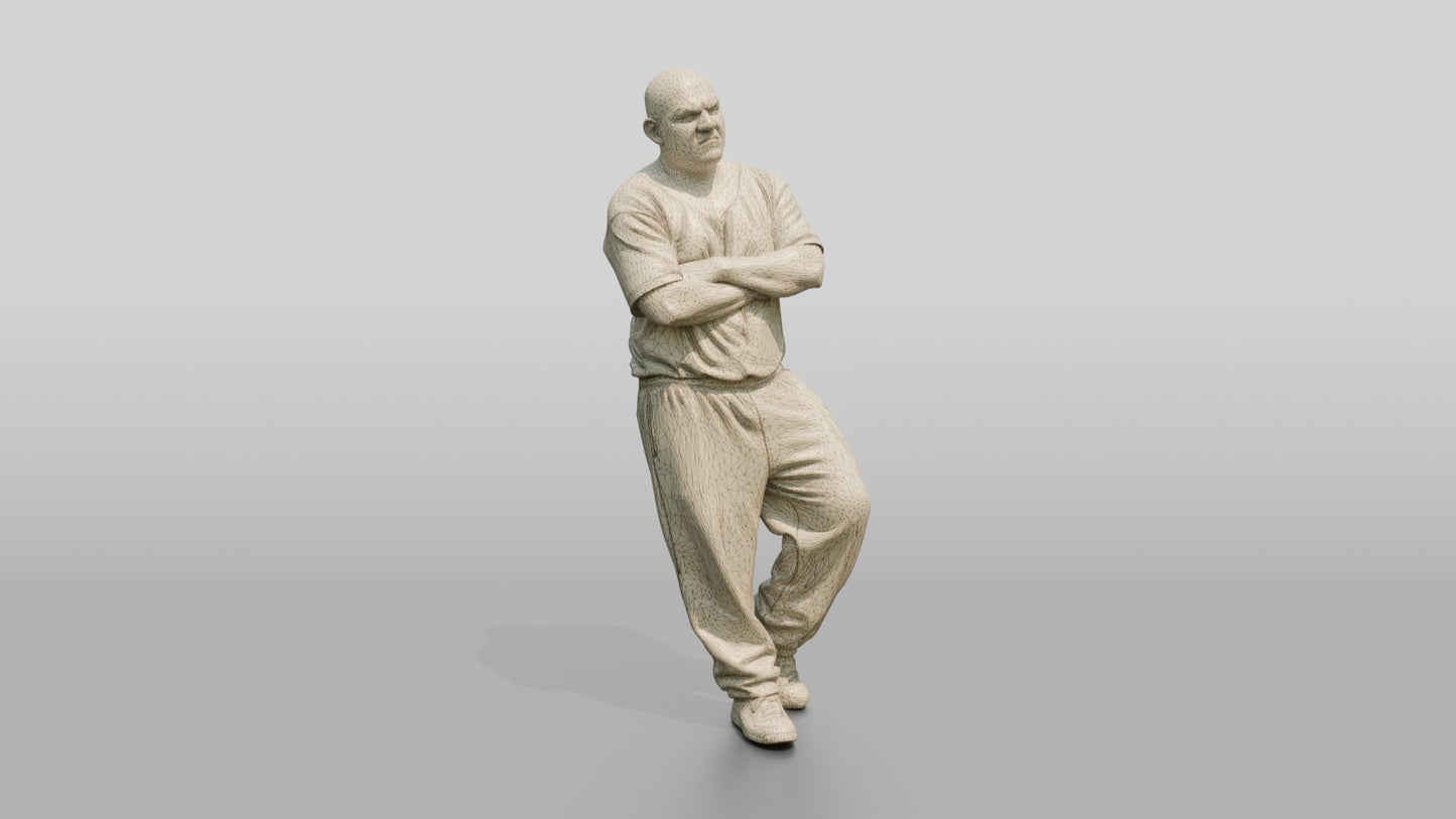Latino Male Prisoner in a Grey T-shirt and Black Sweatpants