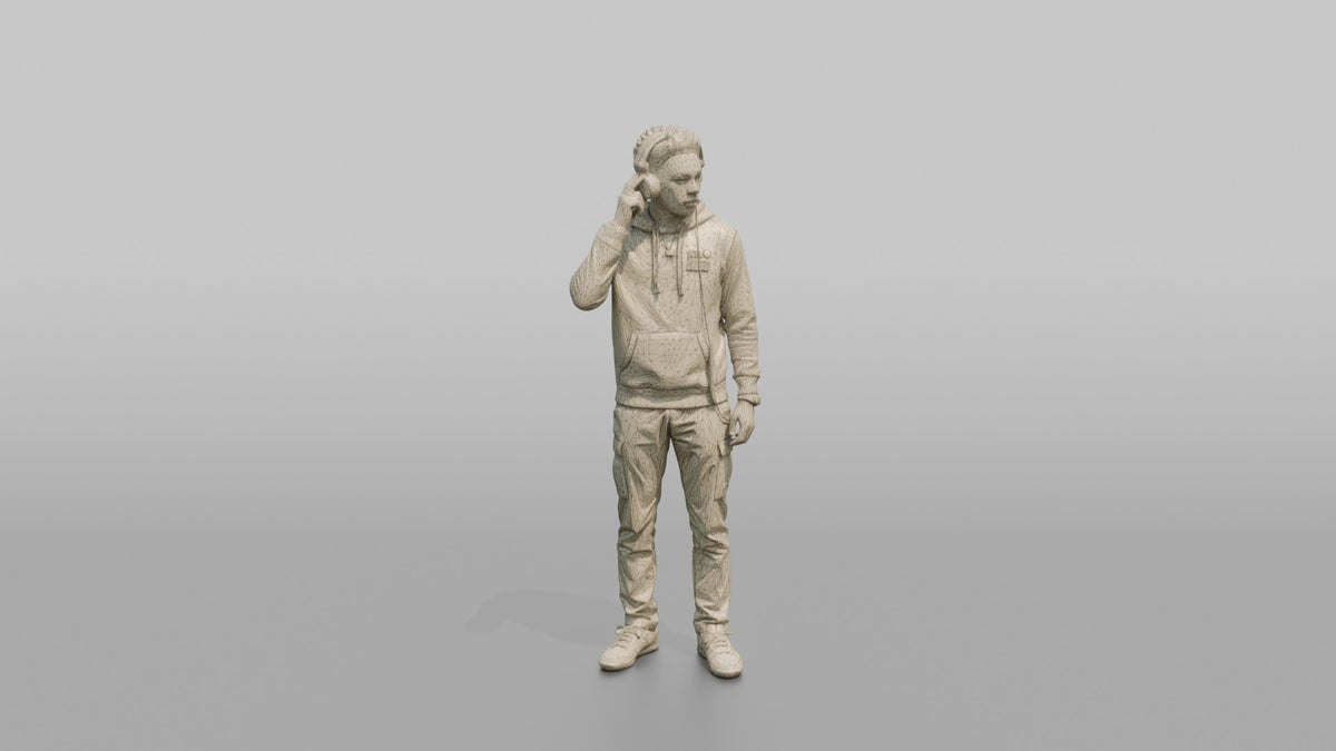 Club DJ Man Wearing Headphones, One Hand Adjusting Them - wireframe topology preview