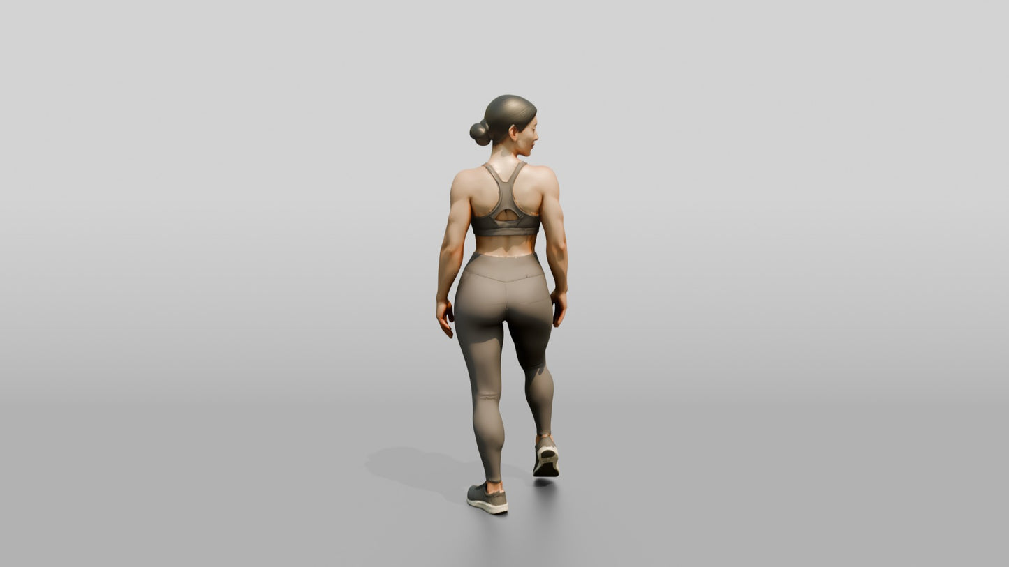 Woman in Taupe Activewear Glancing Over Her Shoulder