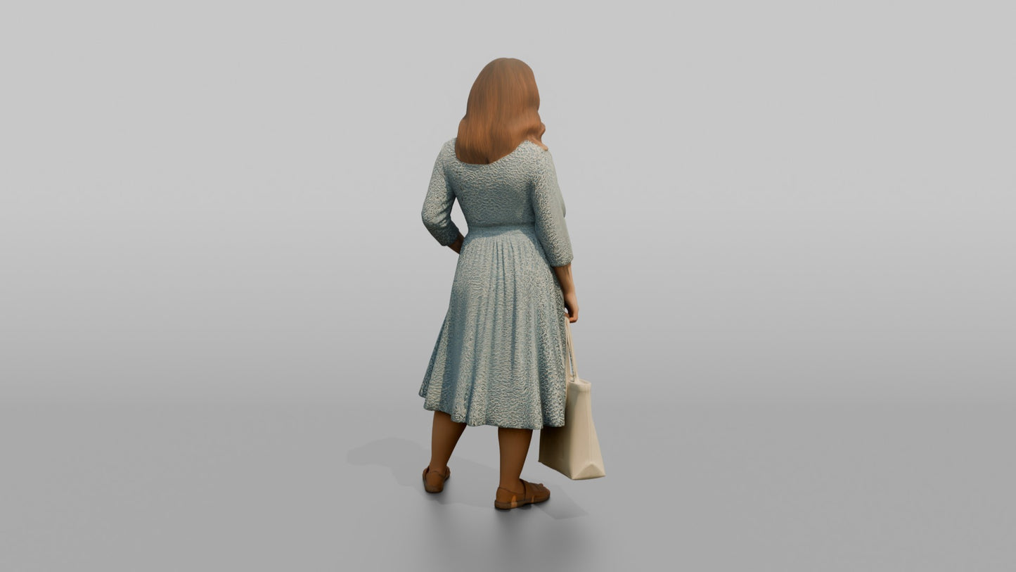 Woman Posing in a Wrap Dress Holding a Canvas Bag