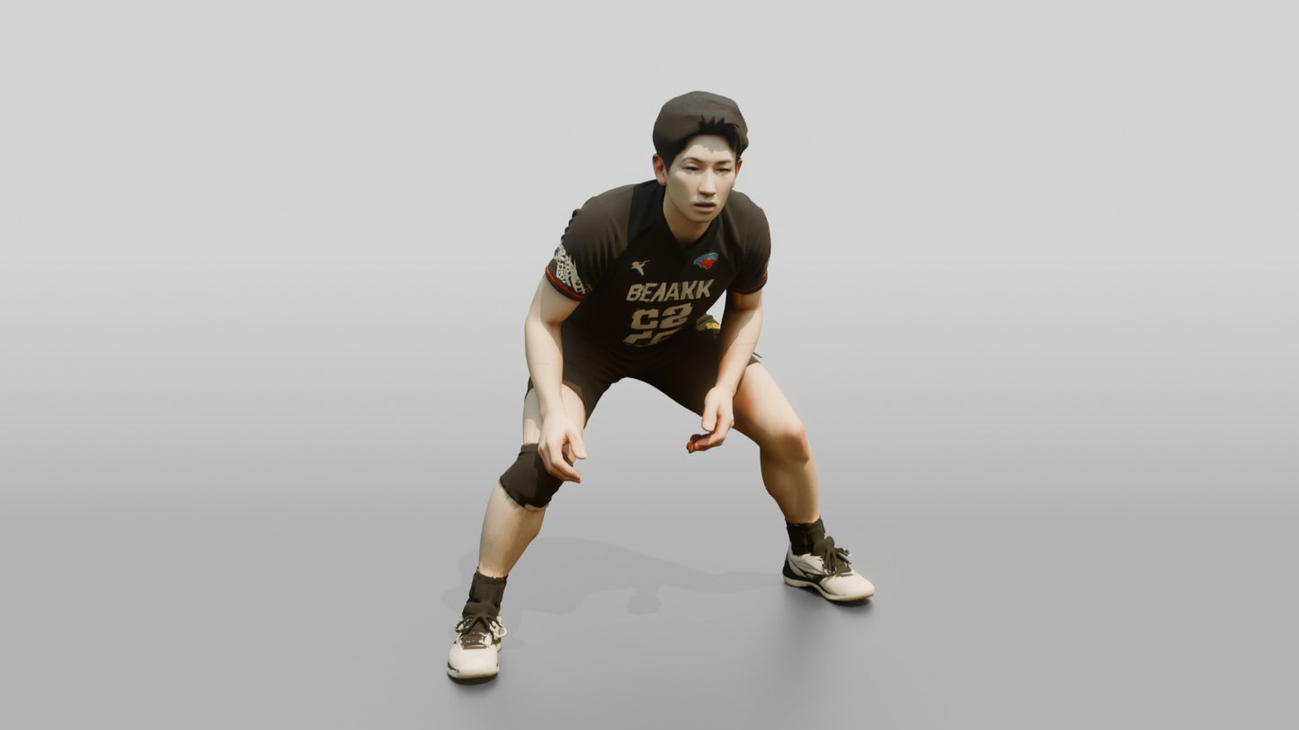 East Asian Male Volleyball Player in Black Libero Jersey