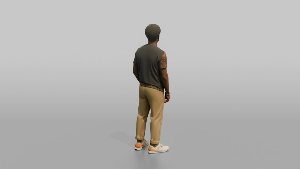 African Man in Ankara Print T-Shirt and Khakis