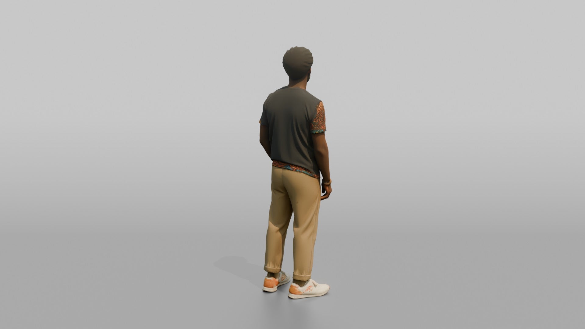 African Man in Ankara Print T-Shirt and Khakis