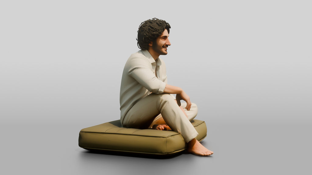 Man Sitting Cross-Legged in Linen