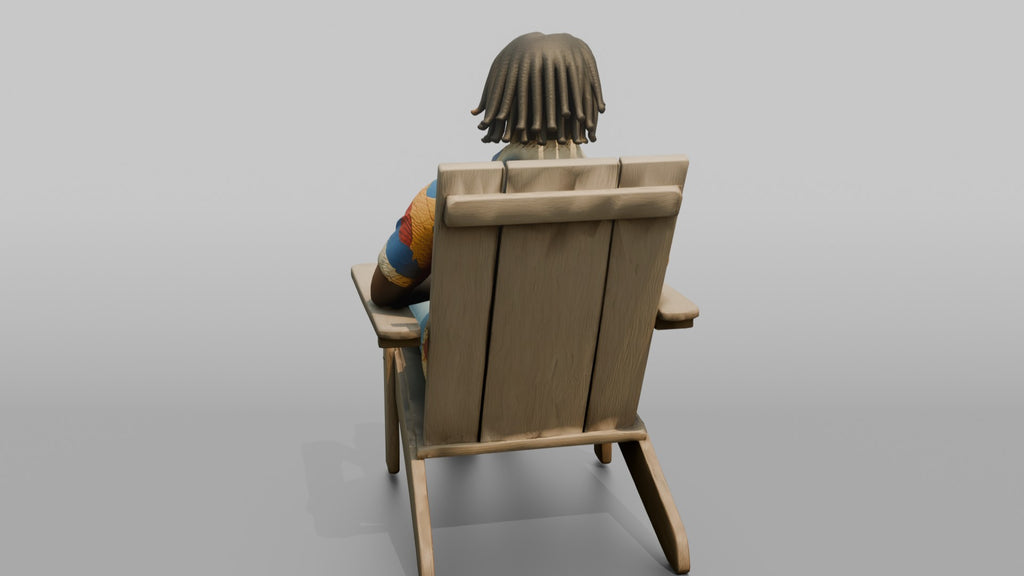African Man with Dreadlocks Sitting in Lounge Chair