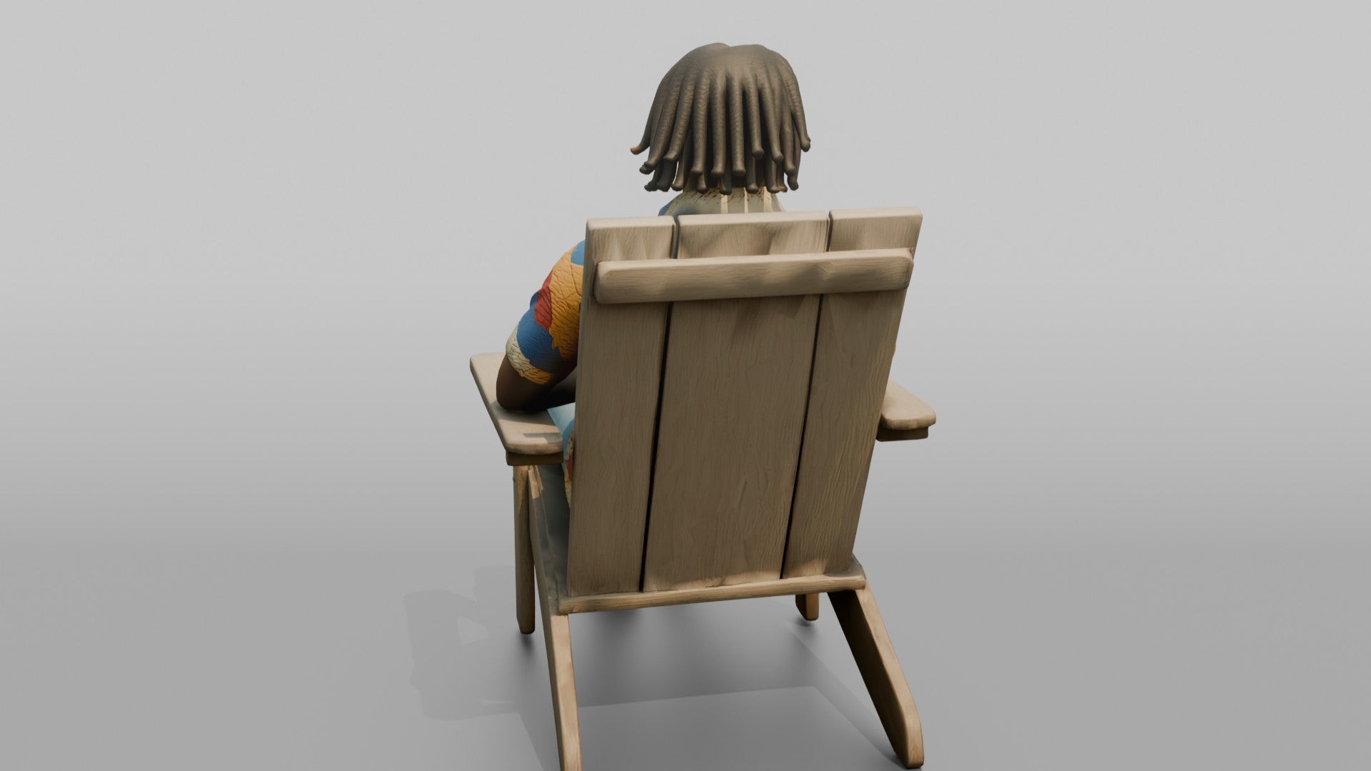African Man with Dreadlocks Sitting in Lounge Chair