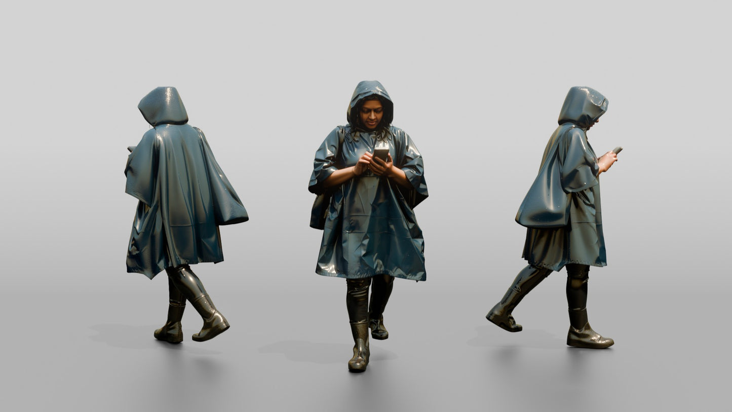Indian Woman in Blue Poncho Checking Phone