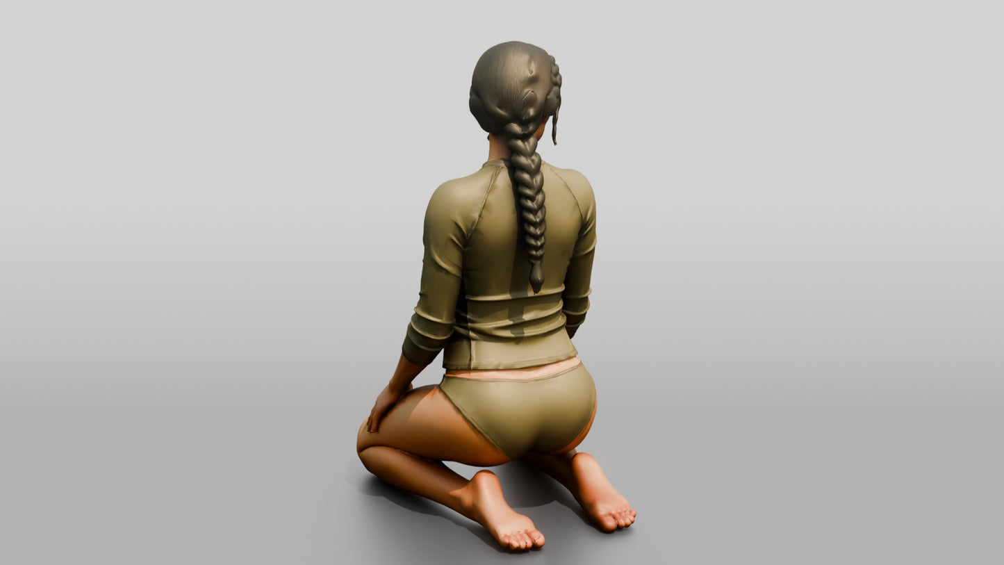 Woman in Olive Rash Guard Kneeling