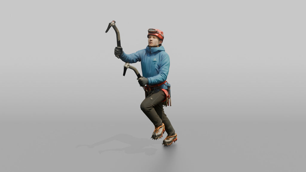 Ice Climber Holding Two Ice Axes