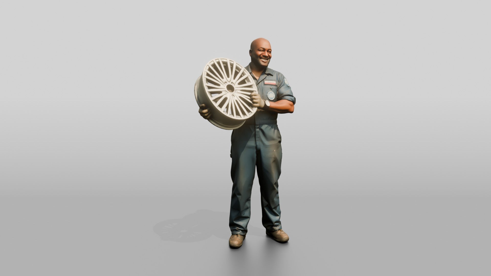 Mechanic Lifting an Alloy Wheel