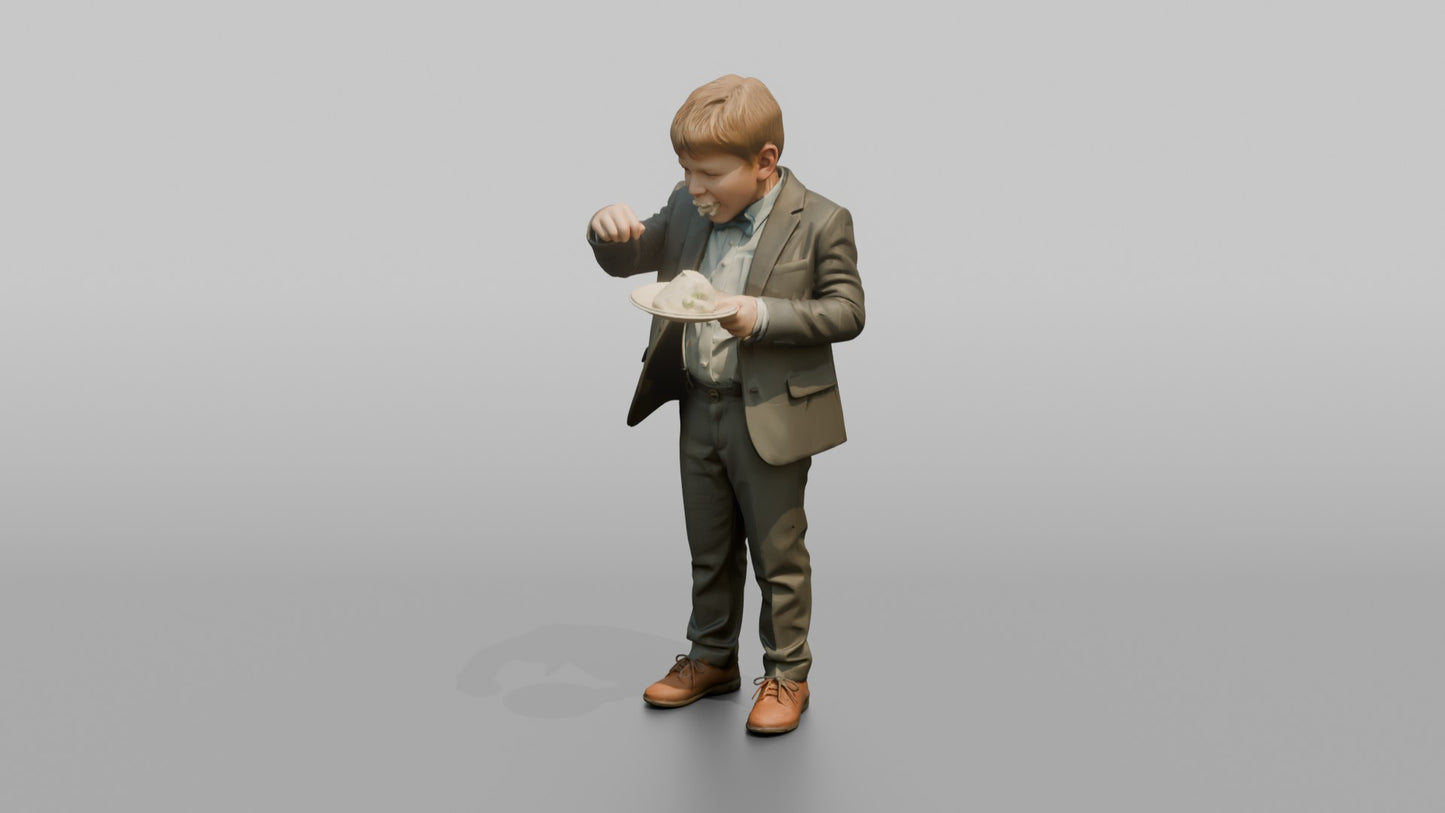 Young Boy Eating a Slice of Wedding Cake