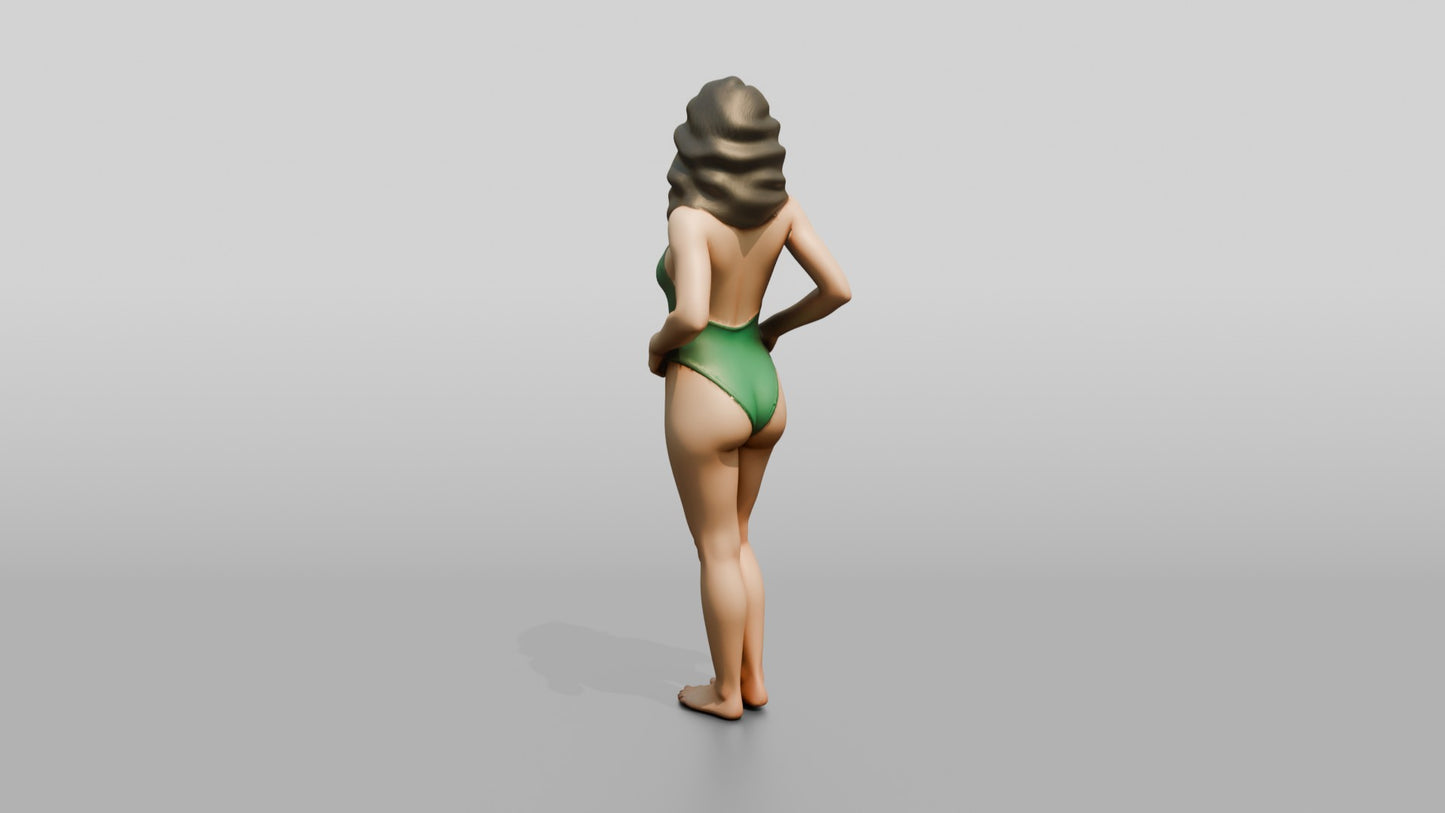 Woman in Green One-Piece Swimsuit with Hand on Hip