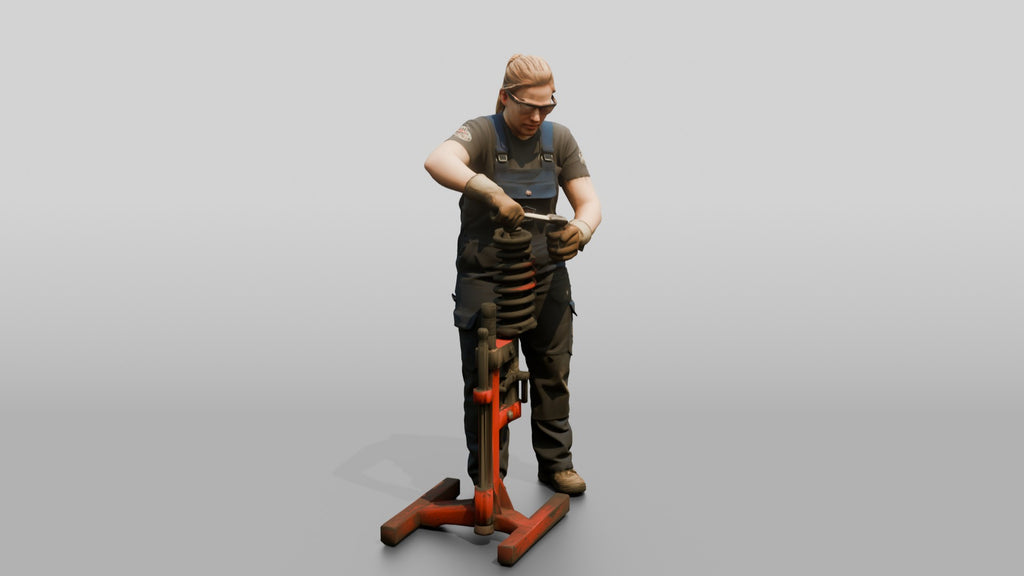 Mechanic Replacing a Shock Absorber