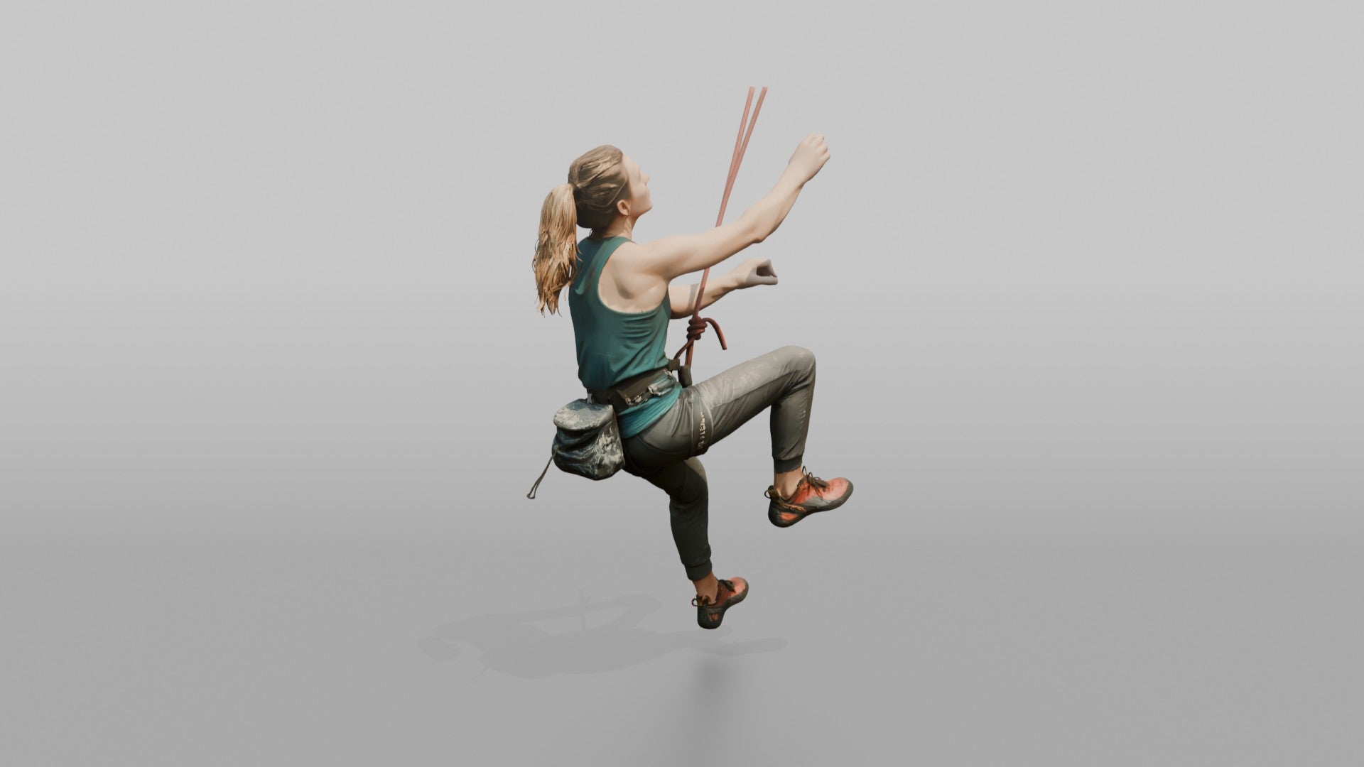 Rock Climber Reaching Upward Mid-Climb