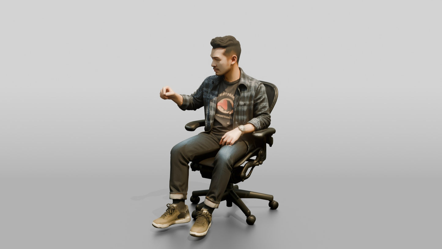 Man Gesturing from an Office Chair