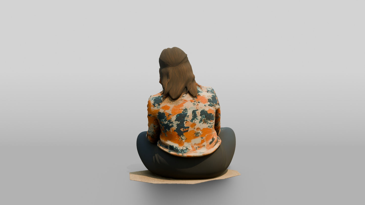 Woman Seated on the Floor with a Tablet