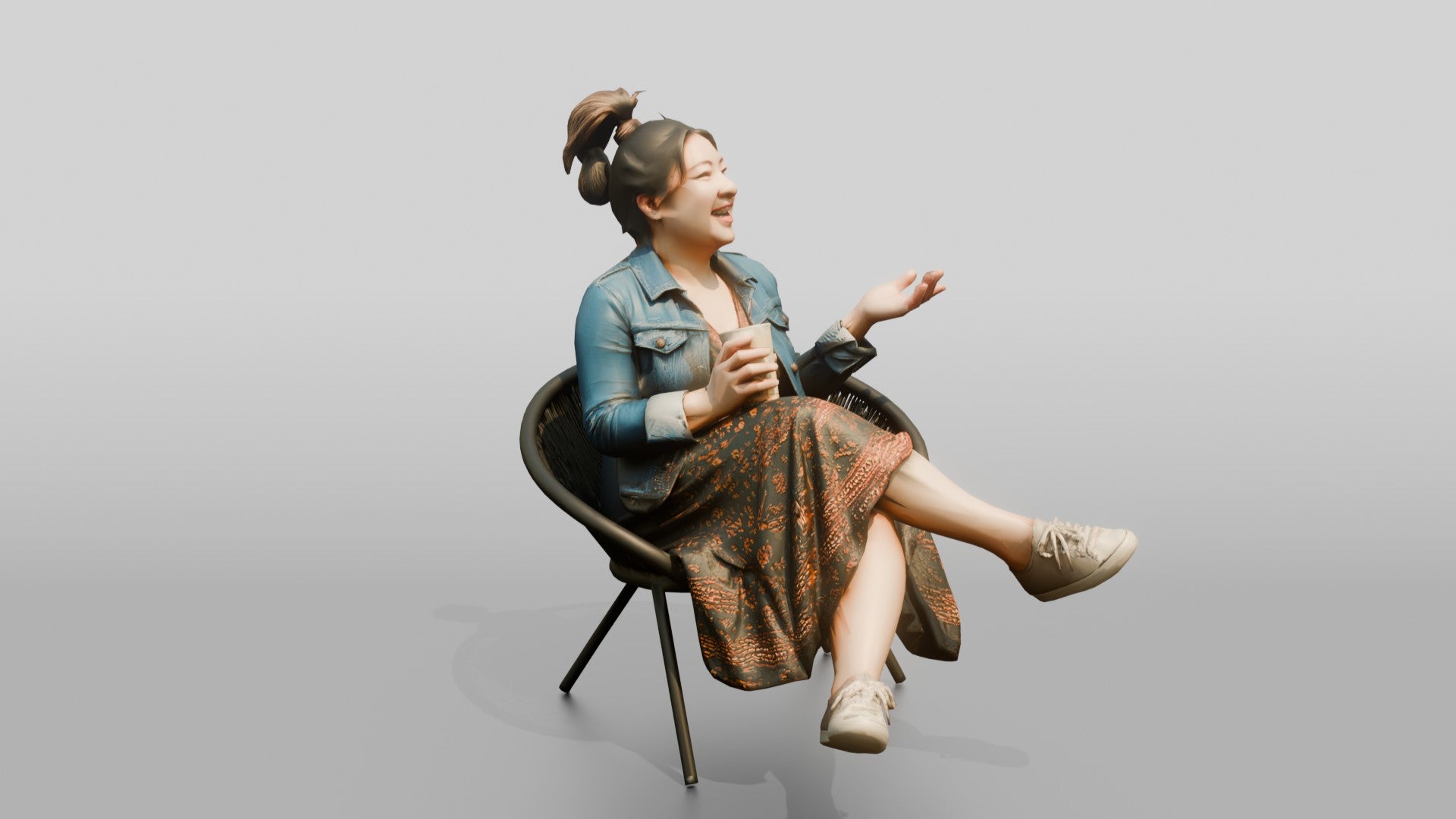 Chinese Woman Laughing While Seated with Coffee