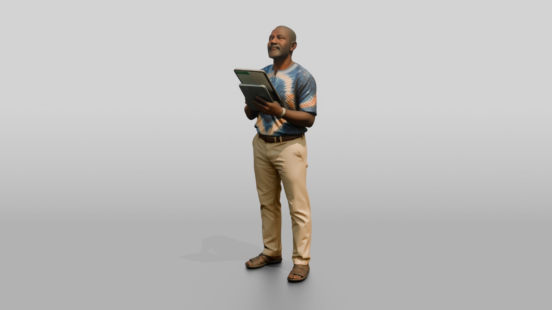 Elderly African Man Holding a Tablet Looking Up