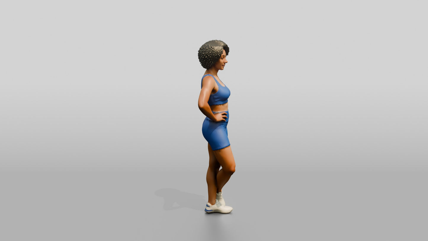 Black Woman in Blue Activewear with Hands on Hips