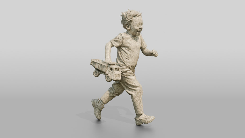 African Boy Running with a Toy Truck