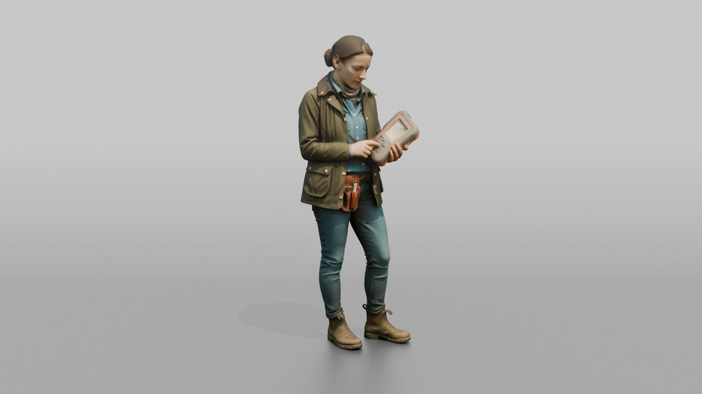 Farmer Holding Livestock Health Monitor Device