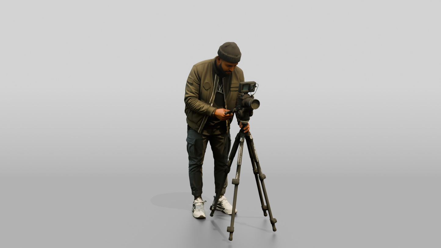 Videographer Setting Up a Camera