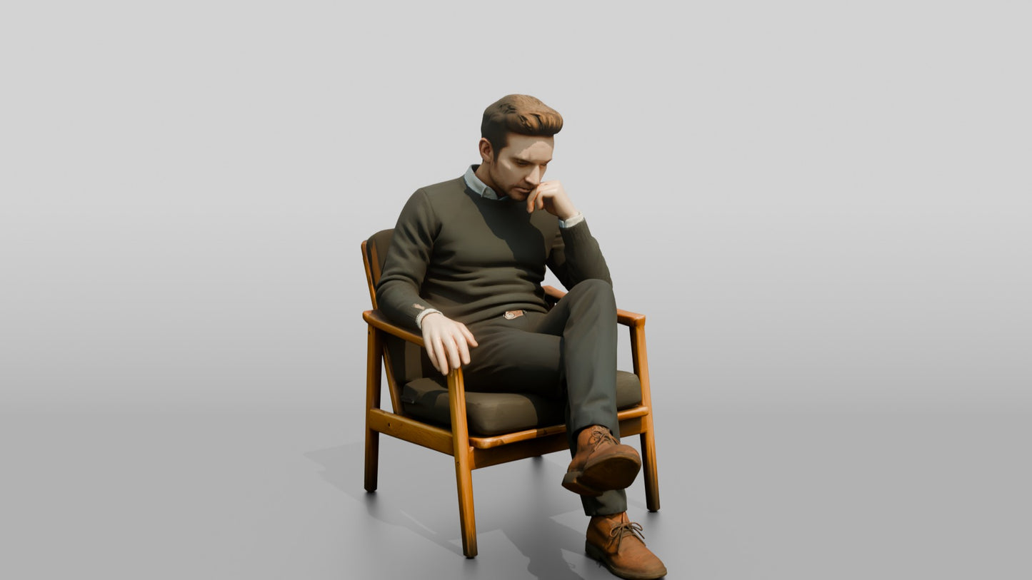 Man Sitting Thoughtfully in a Chair