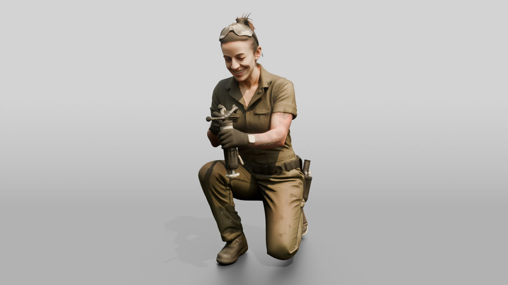 Mechanic Greasing a Suspension Joint
