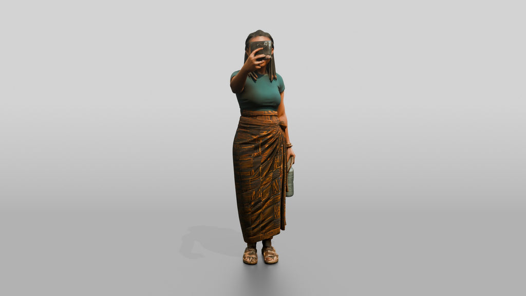 Young African Woman Taking a Selfie in a Wrap Skirt