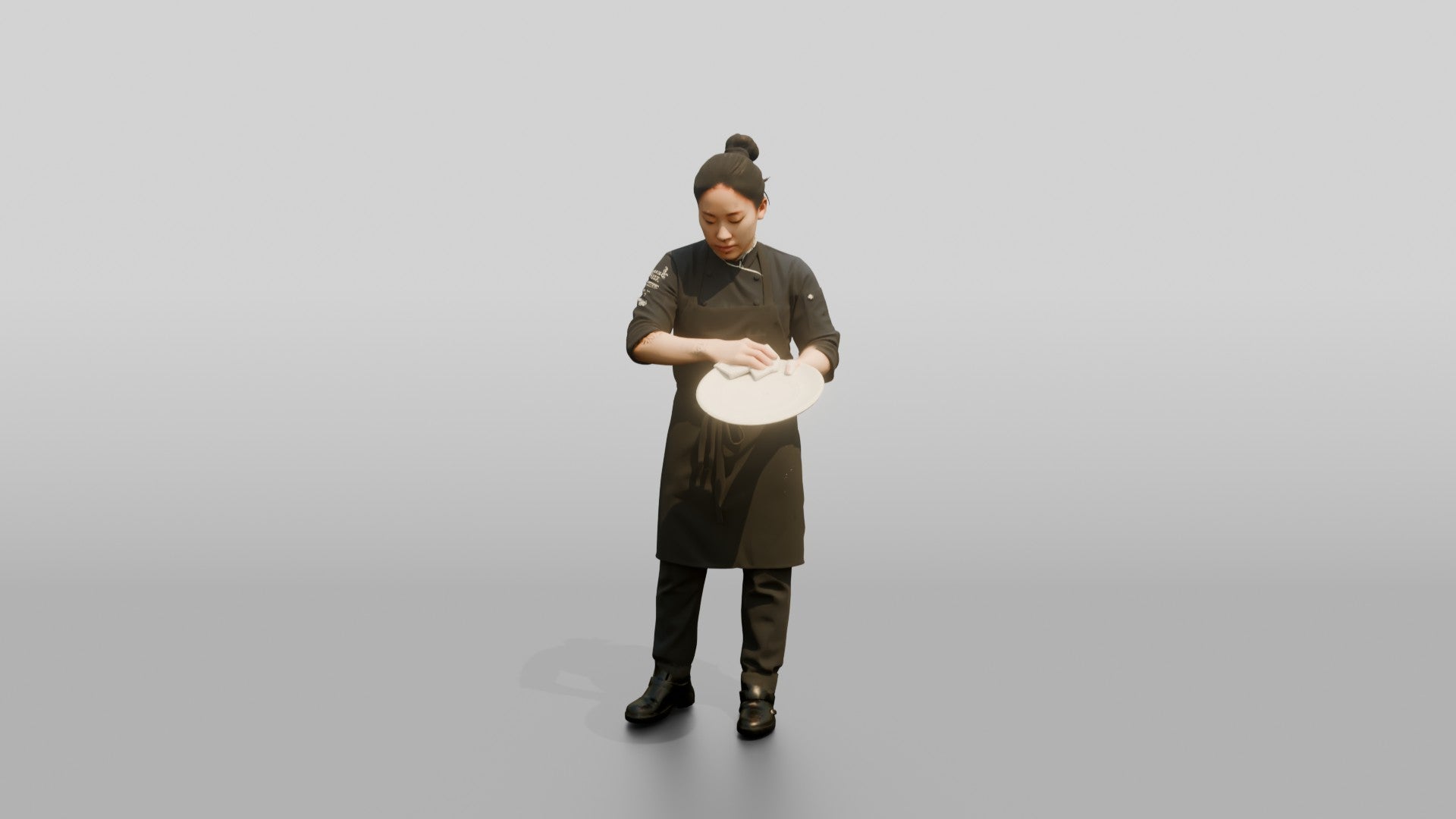 Chef Wiping a Plate Rim