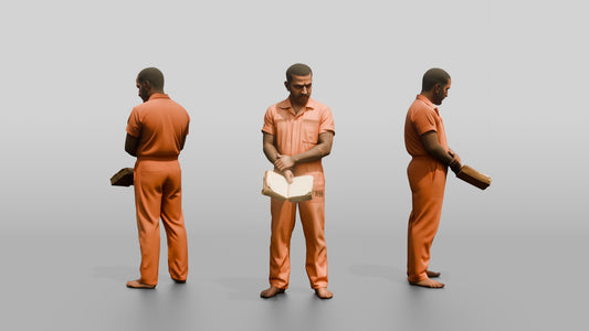 South Asian Male Prisoner Holding a Worn Book Open in One Hand