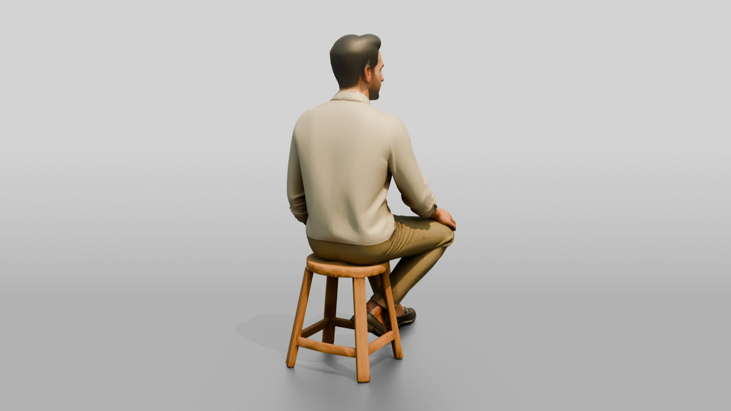Man Relaxing on a Stool in Linen