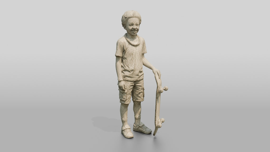 African Boy Holding a Skateboard