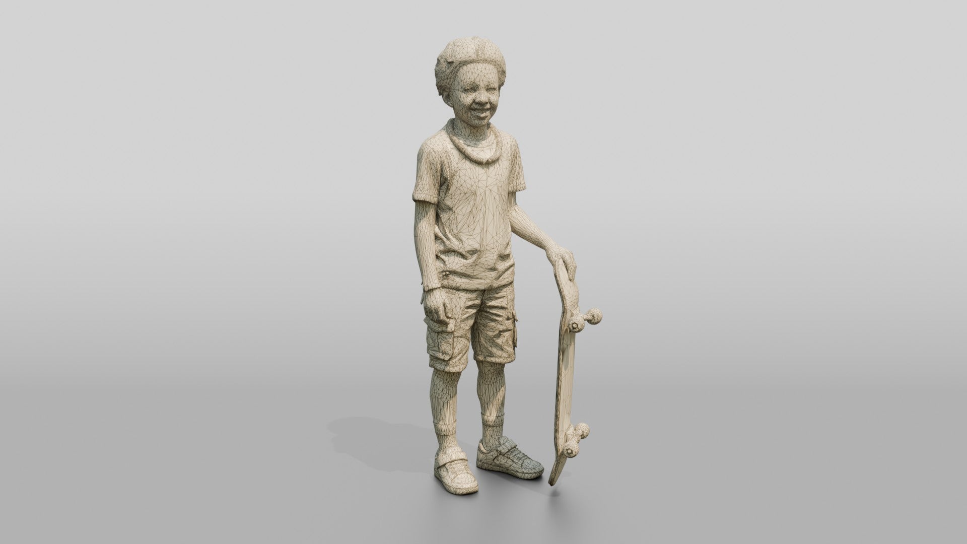 African Boy Holding a Skateboard