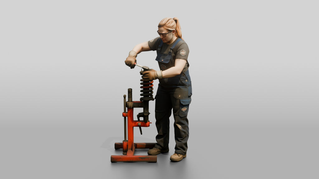 Mechanic Replacing a Shock Absorber