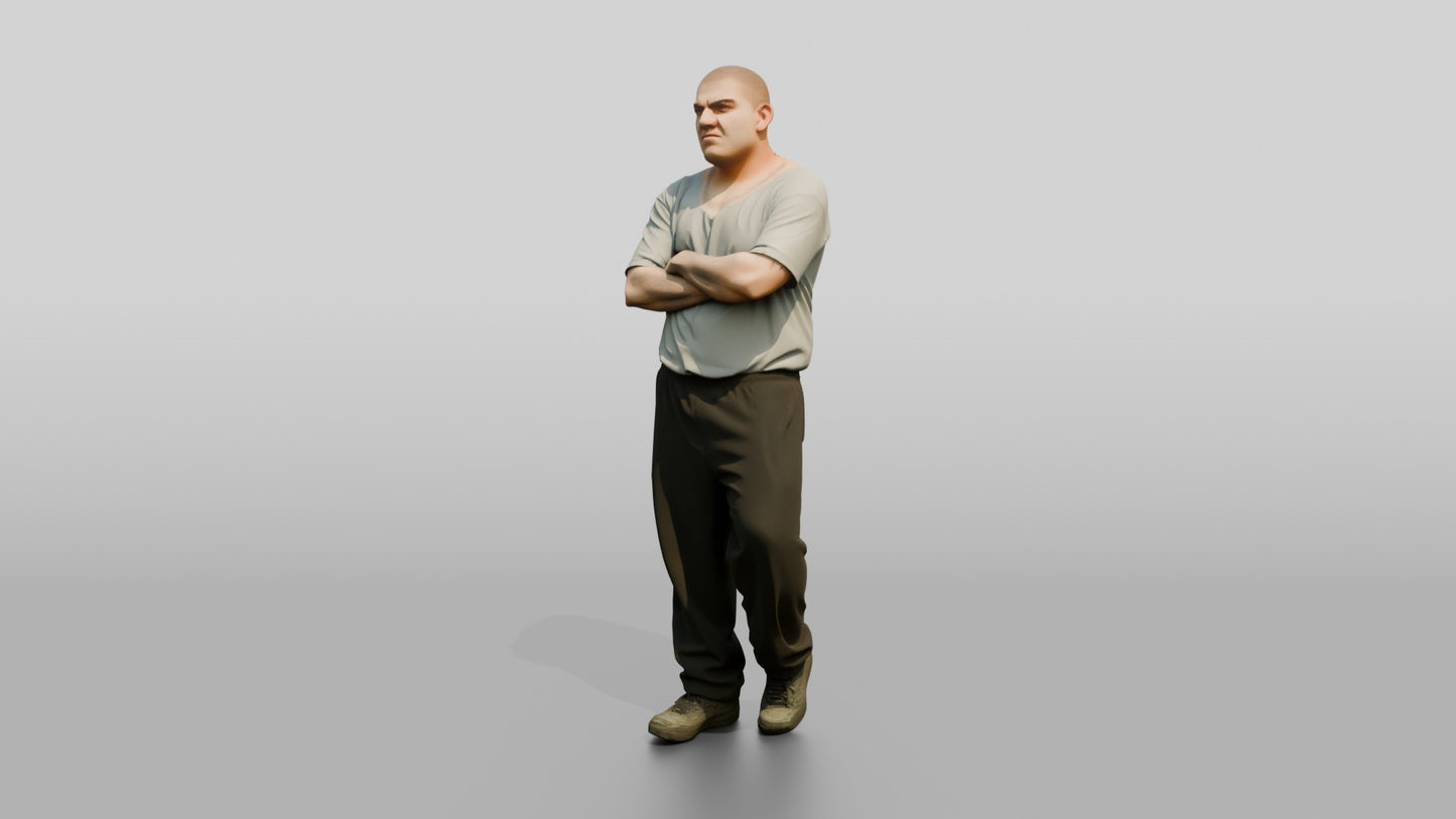 Latino Male Prisoner in a Grey T-shirt and Black Sweatpants