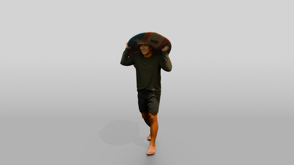 Man Lifting Surfboard Onto His Shoulder
