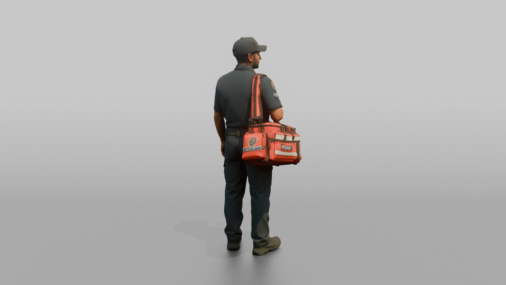 Firefighter Man Carrying a Bright Red Medical Emergency Trauma Bag
